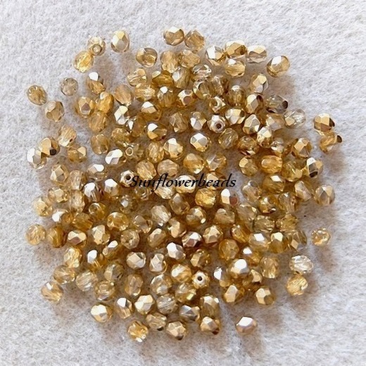  - 50 Stück böhmische Glasschliffperlen kristall halbgold 4 mm 