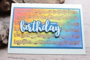 Glückwunschkarte zum Geburtstag - Regenbogenfarben, Notenpapier-Motiv
