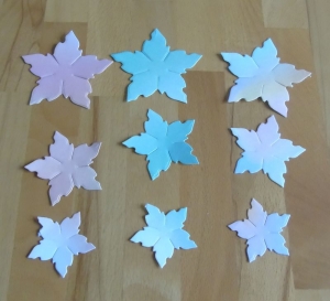 Stanzteile Set mit pastellfarbenen Sternblüten // Streudeko // Basteln // Scarpbookig // Blumen // Dekoration - Handarbeit kaufen