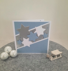 Schöne Weihnachtskarte mit Sternen und blauen Hintergrund, Karte ist mit glitzer Steinchen verziert