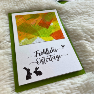 Handgefertigte Osterkarten in Gelb, Orange und Grün mit Osterhasen Eine handgemalte Karte zum Osterfest