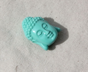 schöne Buddha Perle 28x20mm Farbe Türkis