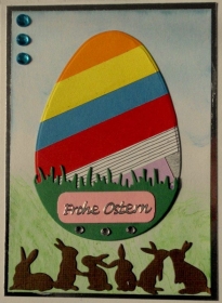 Selbstgestaltete Karte zu Ostern mit einem großen Ei und kleinen Häschen - Handarbeit kaufen